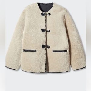 Brand new with tags. Iconic Mango sell-out faux-shearling jacket.